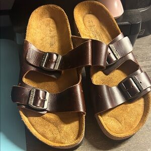 Naot Santa Barbara sandals. They feature a classic two-strap slide design